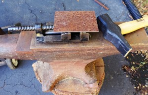 Piece On the Vice Backed Up by an Anvil